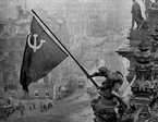 Raising_a_flag_over_the_Reichstag_600x778.png